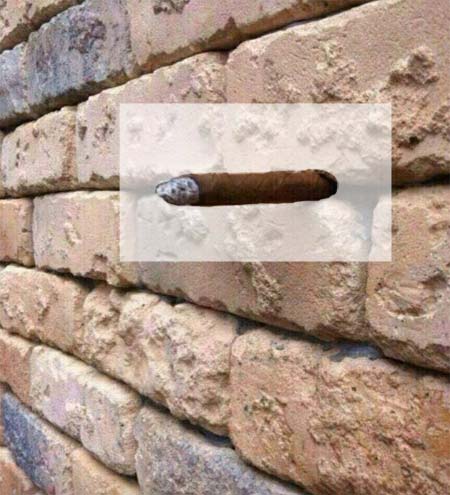 Optische Täuschung mit Mauer: Lösung: Zigarre